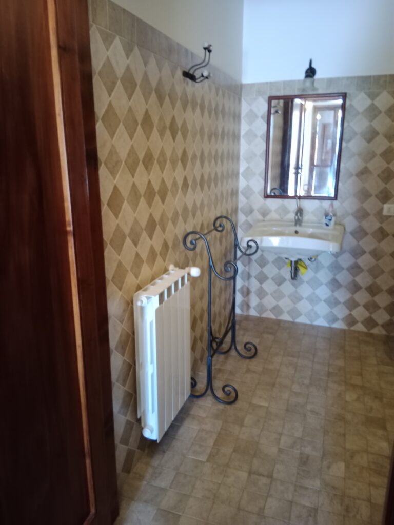 Badezimmer  im Apartment